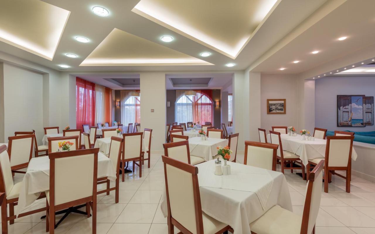 Denny'S Inn Kalamákion المظهر الخارجي الصورة